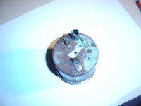  undo the three nuts on the back (5mm)